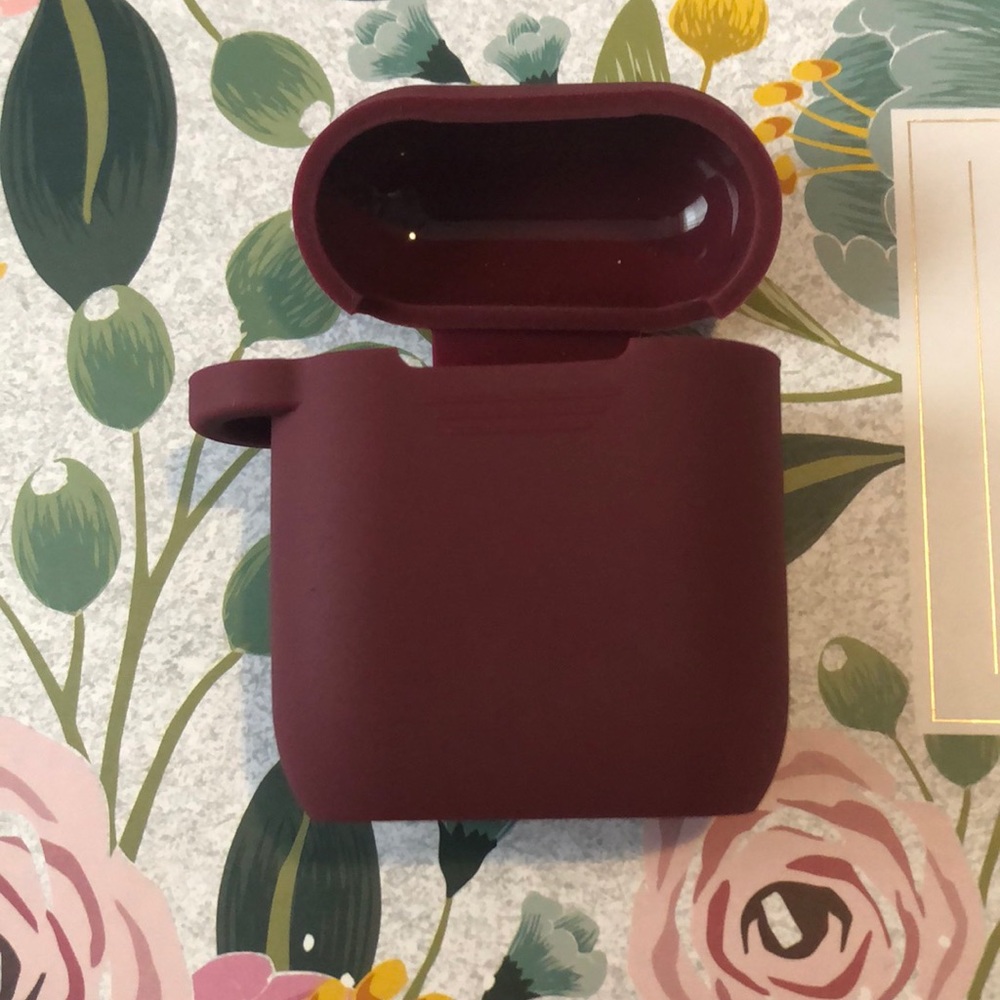 A burgundy are pods case